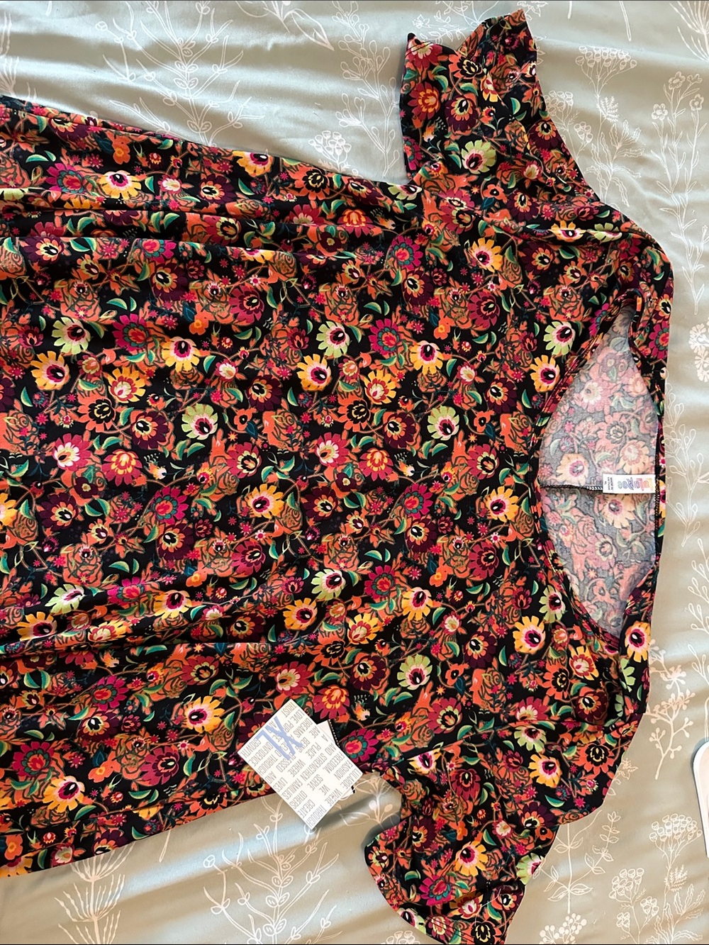 LuLaRoe Floral Scoop Neck Tunic in Black with Red, Orange, Yellow and Green